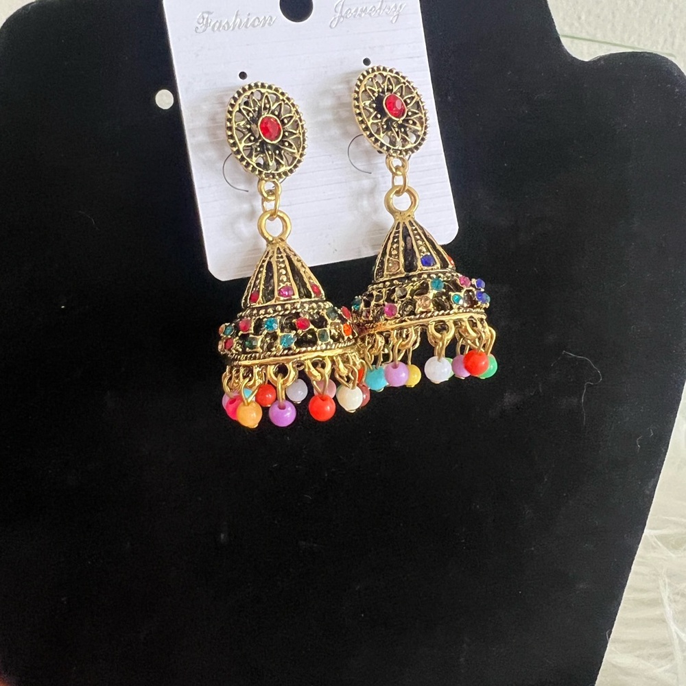 Gold and Red Chandelier Earrings with Intricate Design